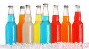 Colorful bottles of sodas on ice